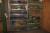 2 subjects steel bookcase with content div springs and gears, etc.
