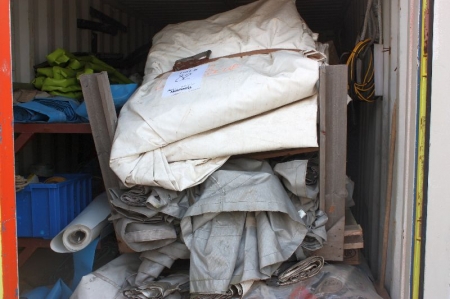 Content in container: tarpaulins, + tarpaulins on the roof of the container