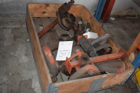 Pallet with different parts for Demag trolley