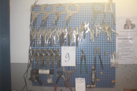 Tool board with content to various clamps, riveter, air tools, etc.