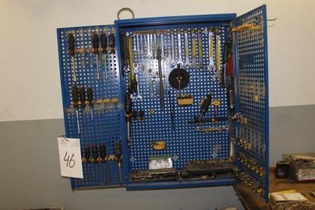 Tool cabinet containing various hand tools, etc.