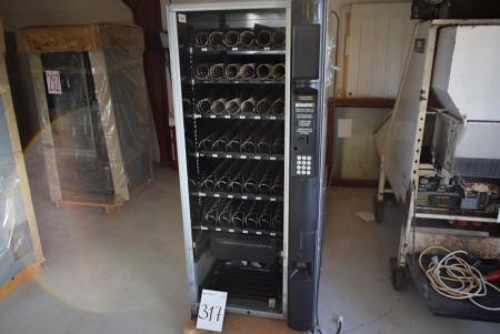 Machine for snacks and drinks for the coin, mrk. Snakky. Glass in front is broken. Without nøgle.Automaten opened and switchable cylinder. New price kr. 23.000, -