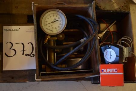 Pump with various gauges + test + thermostat, etc.