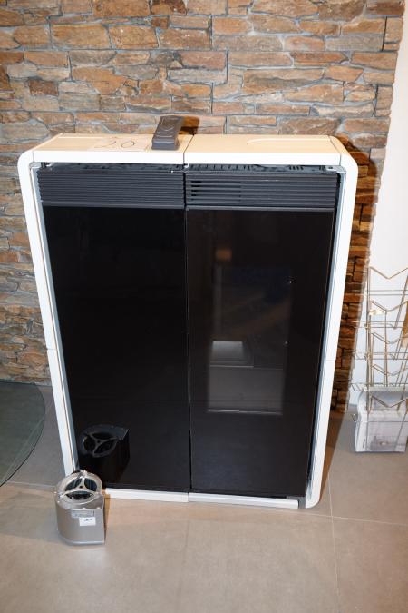 Pellet stove Edilkamin Tiny. Unused pellet stove in white. H: 121 cm x W 87.5 cm x D 26 cm. Operating range from 2.8 to 9 kW. Weight 217 kg. Possibility for top outlet and moving warmed to other rooms.