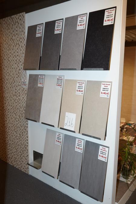 Exhibition Tiles in different sizes and colors. Wall fittings included but must be removed by the purchaser.