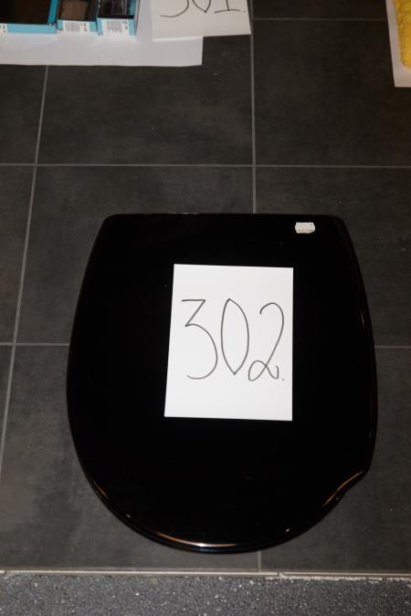 Toilet seat from Pressalit in black.