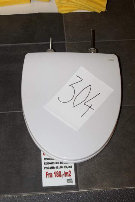 Toilet seat from Pressalit in white.