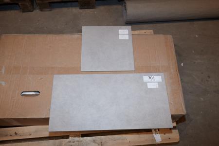Floor tiles. 541 Grey, str. 30x60 cm. Approximately 19.62 sqm. 541 gray 30x30 cm. Approximately 3.5 sqm. Note: standing on two pallets.