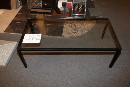 Glass table from Hurup Furniture. Has been kept up a warehouse and therefore incurs some scratches. H: 40cm x W: 120cm x D: 60cm.