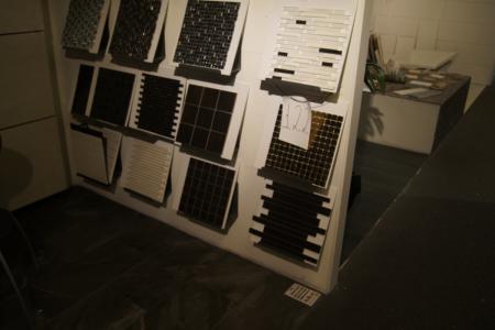 Exhibition Tiles in different sizes and colors. Wall fittings included but must be removed by the purchaser.