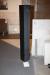 1 piece. pillar of black granite with a hole in the middle. Two blank and two matte sides. 160.3 x 20 x 20 cm.