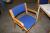 Square table with 4 chairs Magnus Olesen with blue fabric