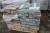 4 pallets of mixed granite tiles in different colors and sizes
