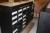 Disk in black with 9 drawers with push pull. L = 180 cm. D = 83 cm (incl.skuffe). H = 97 cm. (Incl.sokkel).