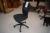 Used office chair in black fabric, with normal use wear.