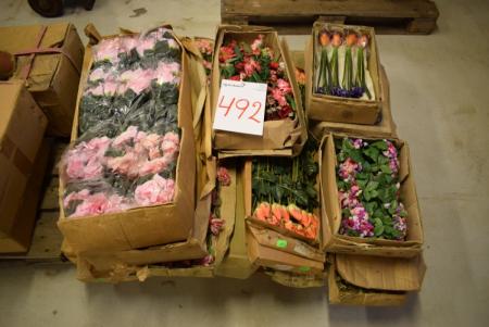 Pallet with various artificial flowers