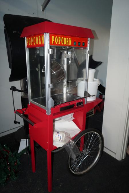Popcorn machine on wheels.