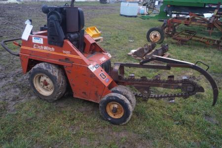 Trencher marked Ditch Witch 1420. 987 hours.