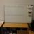 El hæve/sænkebord  180 x 90 cm.  , reol, skuffesektion, stol, whiteboard