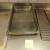 Table stainless steel 150 x 70 x 87 cm. With 6 si 3 trays with lids, 6 grates