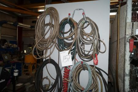 Various air hoses on the wall