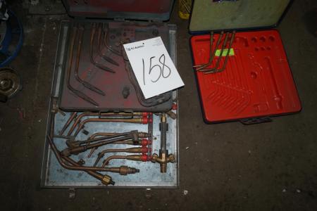 Various boxes with cutting burner parts