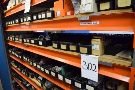 Various bushings, conical pins etc. on the shelf
