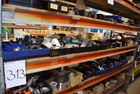 Diverse machine parts, easy-lock, pipe clamp, air piston, etc. on the shelf