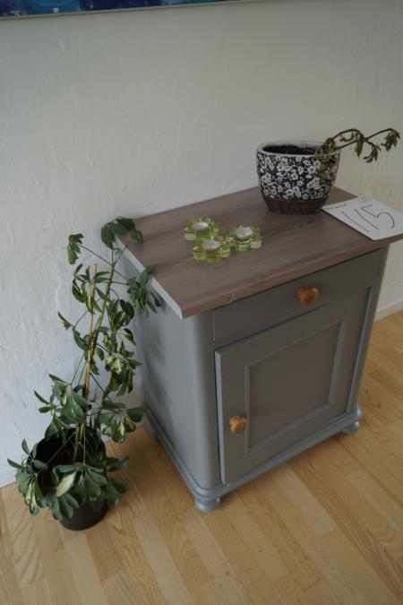 Little sideboard with 2 pictures