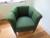 Armchair with green fabric