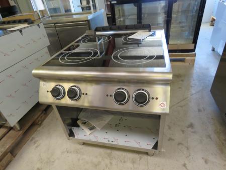 Modular Em 90/80 Ind Induction plate on the open cabinet. 4 cooking zones: back 5 + 5 kw, front 5 + 5 kw