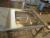 Rustfrit bord med vask og ben for påsætning af maskine. 230x70x90 cm