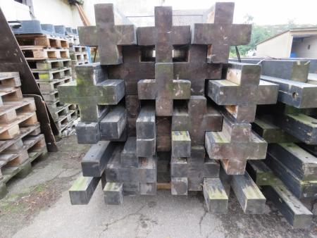 Pallet with impregnated wooden poles together as pillars height approx (3 meters have been used to have the time)