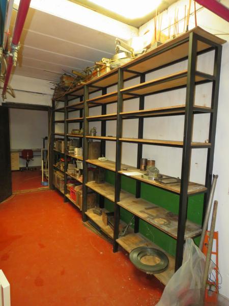 Bookcase with content. Tool steel shape and so on.