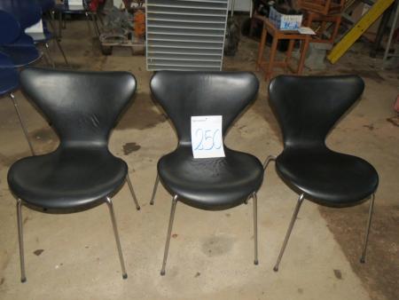 3 pieces Fritz Hansen "7's chairs" with black leather with traces of wear and patina