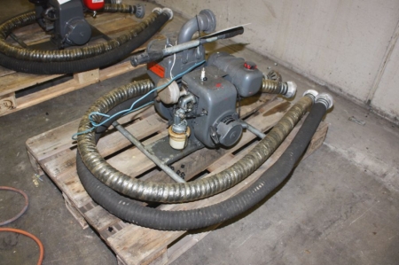 Motorized pump with suction hose