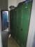 Dark green wardrobe with 5 rooms. 191x150 cm with wheels.