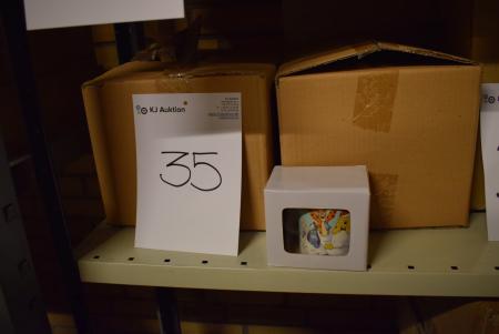 24 Disney mug in box, Reg. Price kr. 49, - per night. PCS.