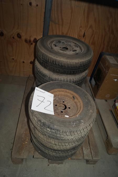 Trailer rims with tires. 4 tires with rims.