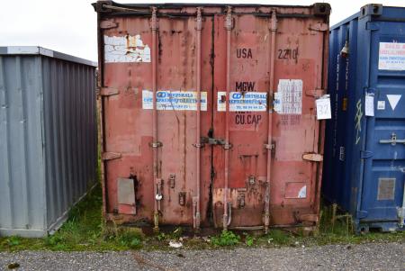 20 foot container with shelving structure in poor condition. But close up.