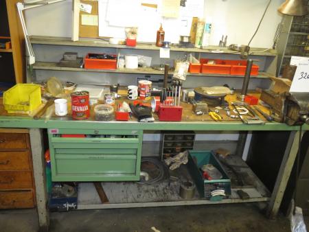 File bench with drawer section and screwdriver with contents.