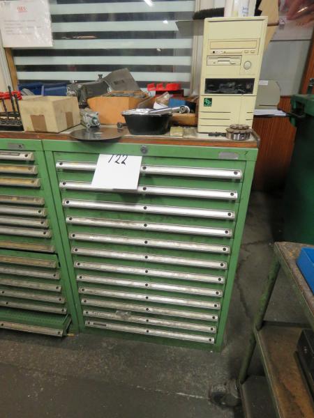 Steel cabinet with various cutting tools.