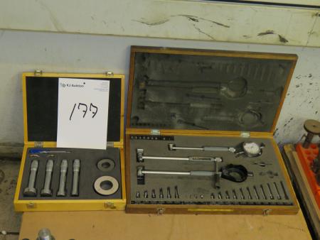 2 boxes with measuring tools.