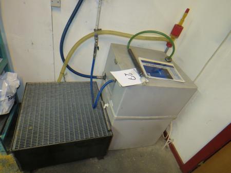 Reverse osmosis system including oil tank with drain plug.