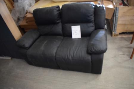2 pers. Black leather sofa with built-in footrest