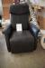 Black leather armchair with footstool