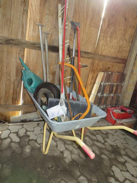 Wheelbarrow with various tools.