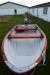 Dinghy with 5 HP Mariner engine year. 2000 + trailer must think oar and extra tank