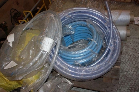Pallet with hose + plastic cover