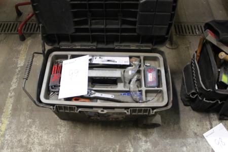 Toolbox on wheels with contents.
